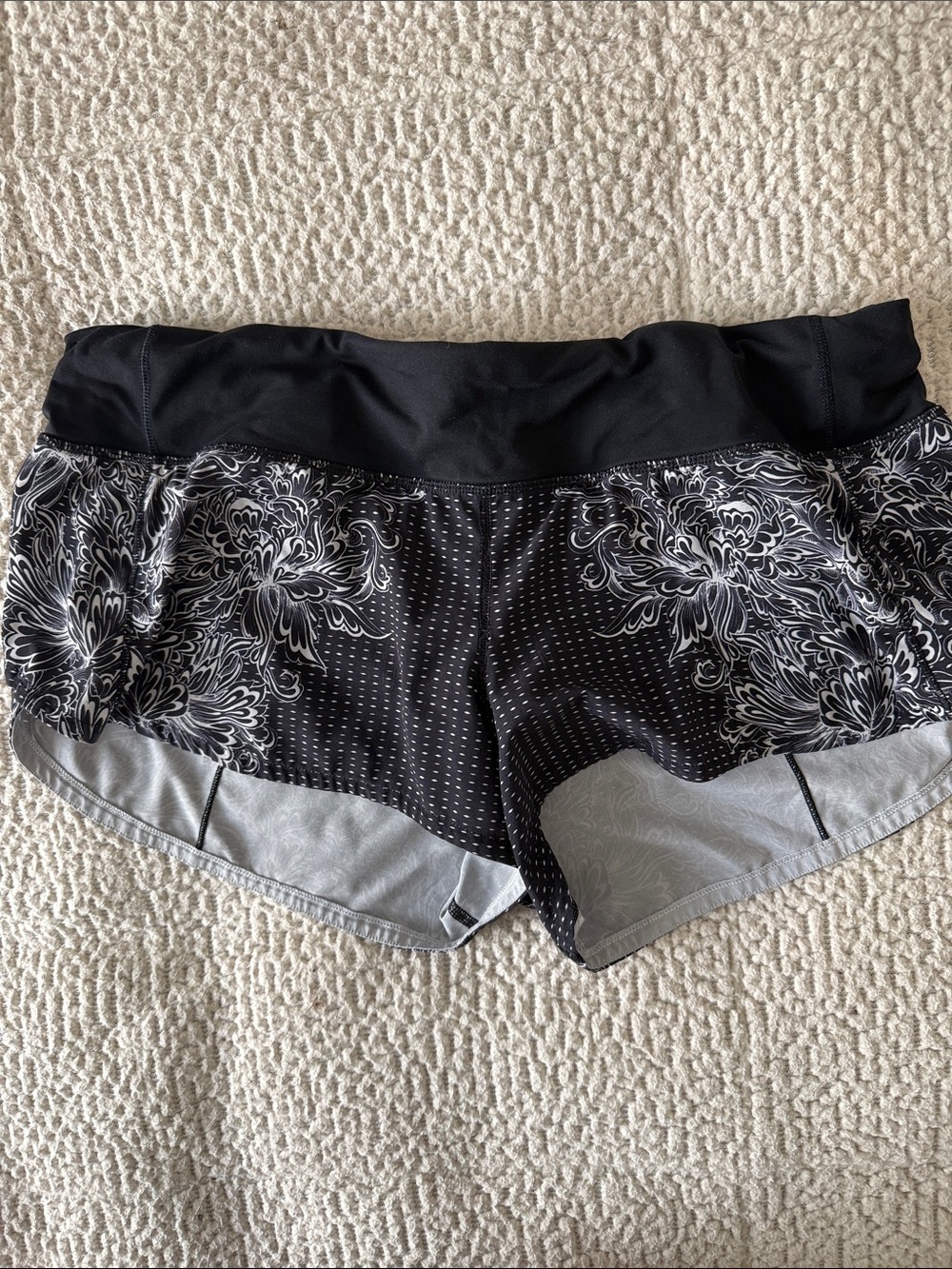 lululemon athletica Speed Up Black Shorts with White Floral Accents
